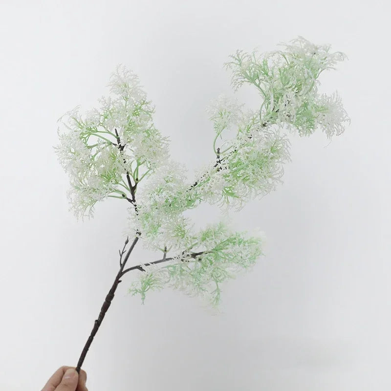Decorative artificial grass plant for interiors