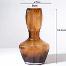 abstract glass sculpture with decorative stripes for interior decoration