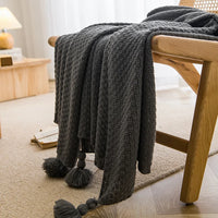 Chunky waffle knit throw with pompom nordic style