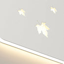Dimmable metal wall light with maple leaf design