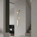 Modern glass and metal wall light for an elegant interior