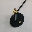 Vintage black and gold metal wall light for elegant interiors