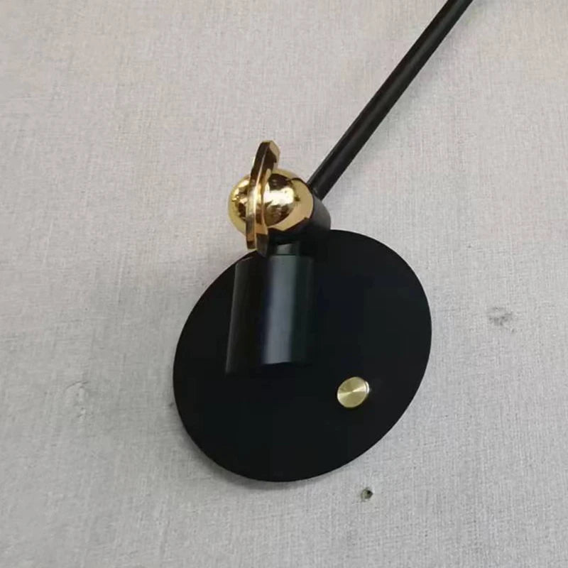 Vintage black and gold metal wall light for elegant interiors - vue 6 sur 7