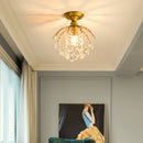 Modern gold crystal chandelier for bright interiors