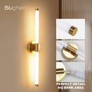Double shade gold wall light