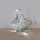 glass vase with decorative stones for flowers and terrarium