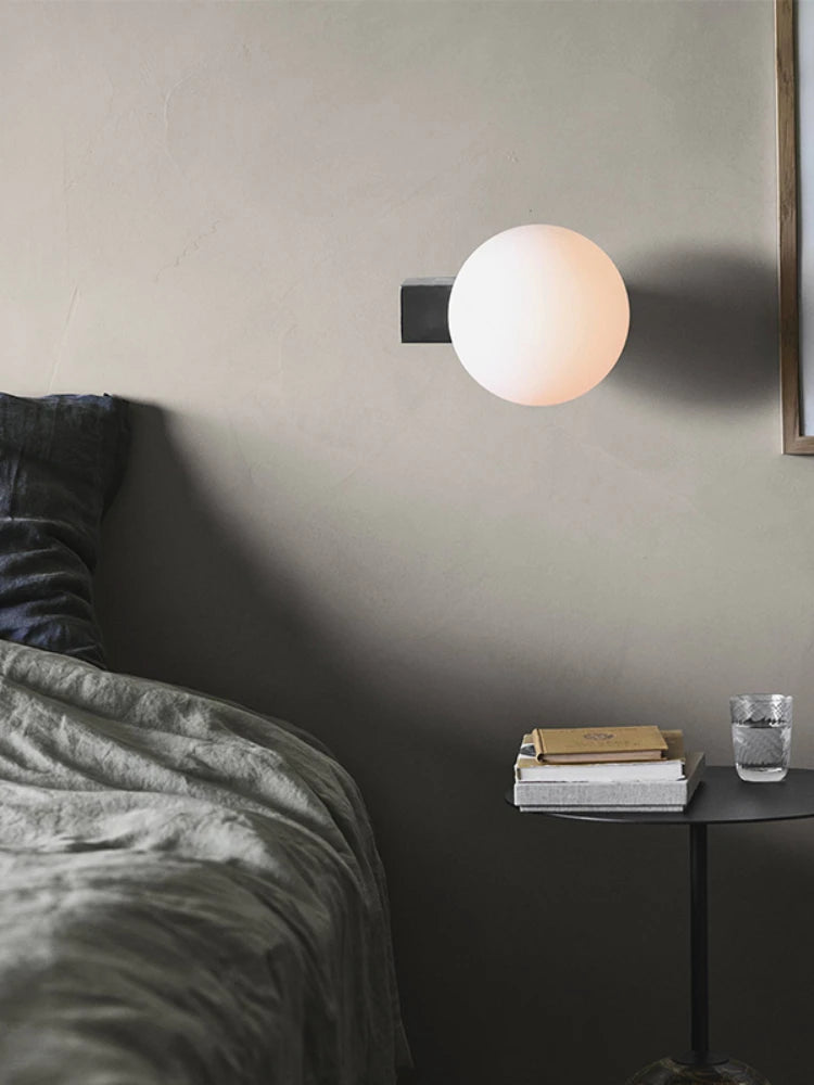 Minimalist stainless steel wall light for modern interiors