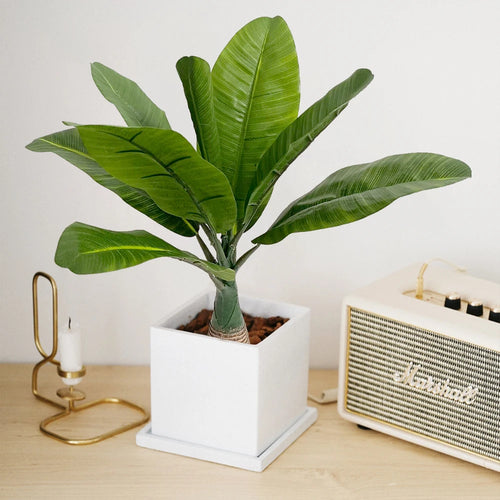 Artificial tropical palm tree in pot for indoor and outdoor decoration