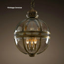 Retro spherical chandelier in iron and glossy glass