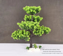 Artificial bonsai plant in plastic for interior decoration
