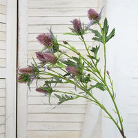 Decorative artificial sea holly flowers in pink and violet