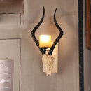 Sheep horn wall light for industrial decor