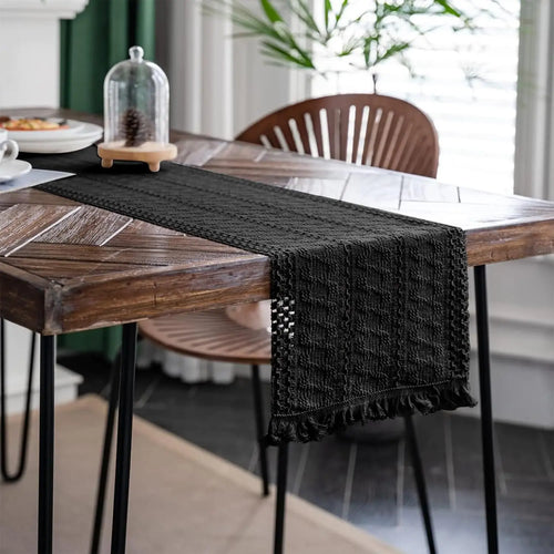 Beige boho table runner with geometric patterns and tassels