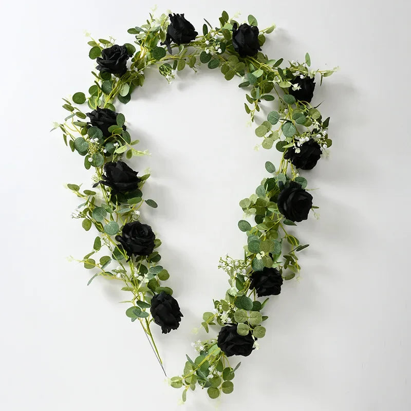 Artificial pink flowers and green plants for indoor decoration