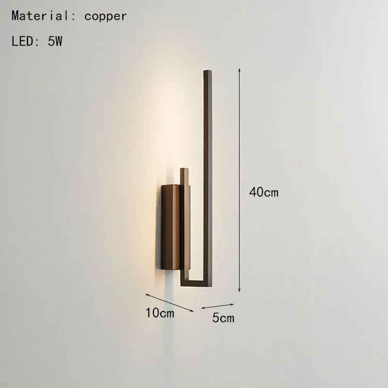 Modern brass wall light for multiple spaces