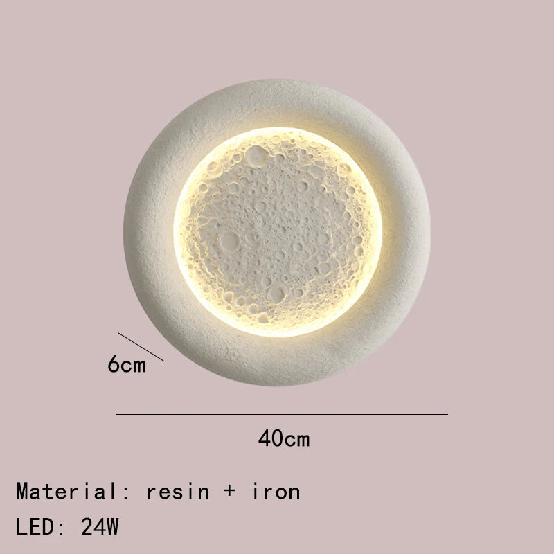 Round moon LED wall light with interchangeable art deco design