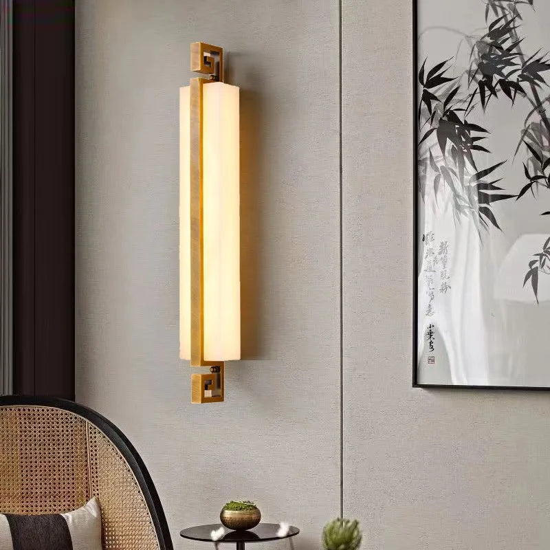 Modern marble and copper wall light with elegant design