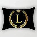 Decorative cushion cover with black and gold letter pattern