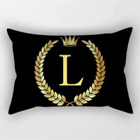 Decorative cushion cover with black and gold letter pattern