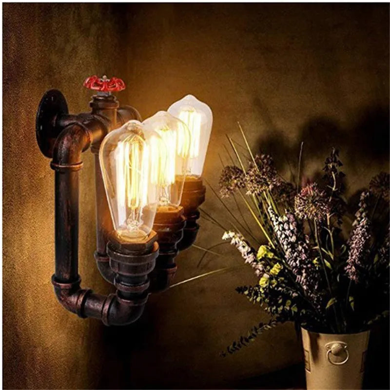 Vintage industrial wall light with decorative valve and water pipe