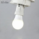 Modern LED wall light with round white glass shade