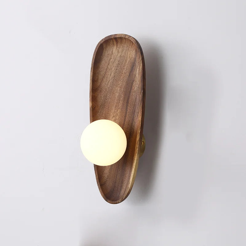 Natural wood wall light with vintage glass shade