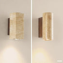 Wabi-sabi LED wall light in natural stone
