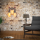 Vintage steampunk iron wall light with water pipe