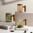 borosilicate glass mug with wooden handle and lid