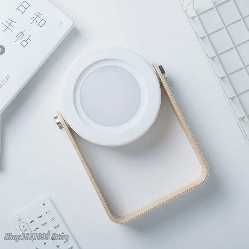 Creative foldable LED table lamp with wooden handle, portable lantern and USB charging - vue 7 sur 9