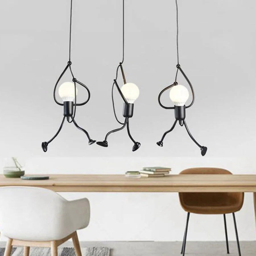 Vintage iron pendant light with cartoon little man design