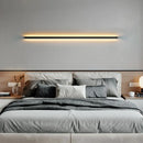 Minimalist cuboid LED wall light in aluminium with remote dimming