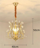 Vintage crystal chandelier with four arms for elegant lighting