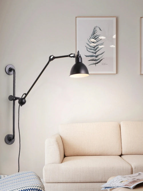 Industrial wall light with adjustable arm for modern interiors
