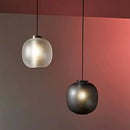 Modern round glass pendant light for various spaces