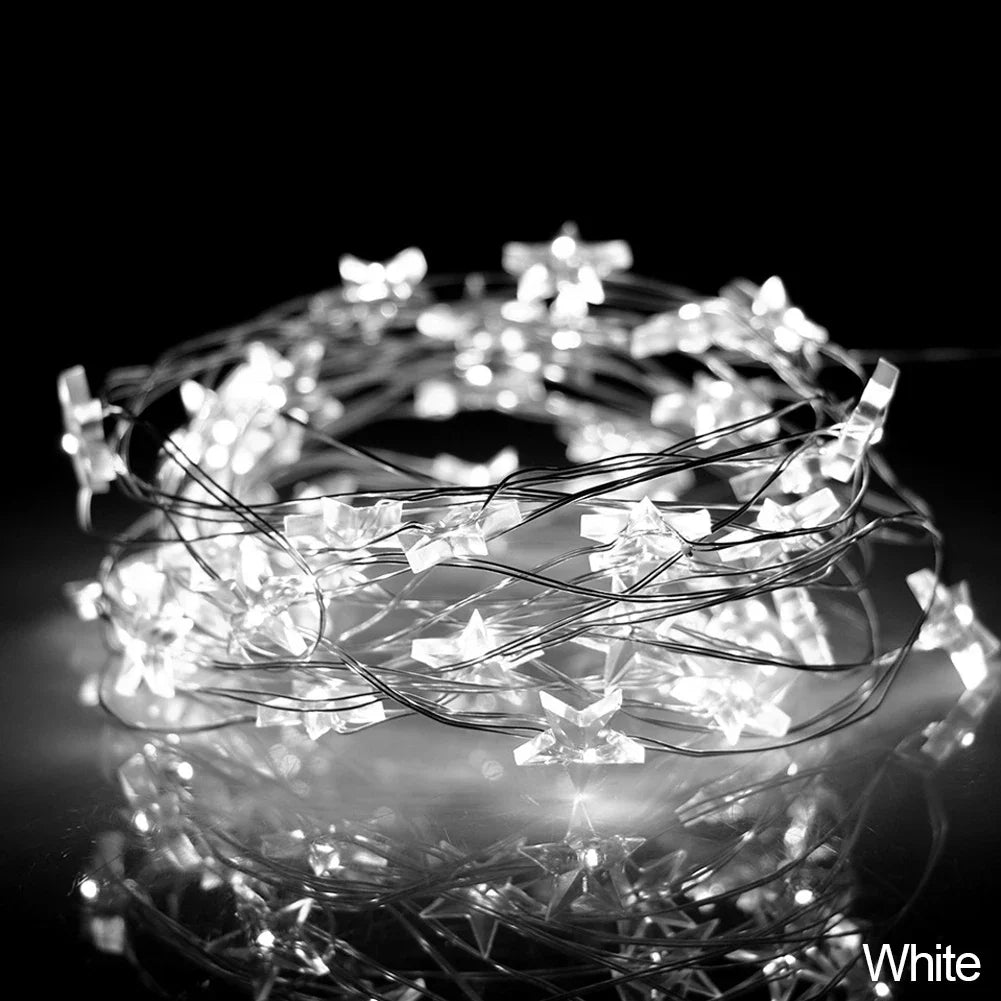 Copper wire string lights with decorative stars, battery operated