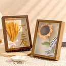 Transparent floating photo frame with dried flowers, decorative and handmade