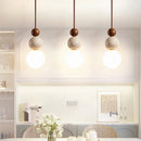 Wabi Sabi round gourd-shaped LED pendant light in yellow tuff