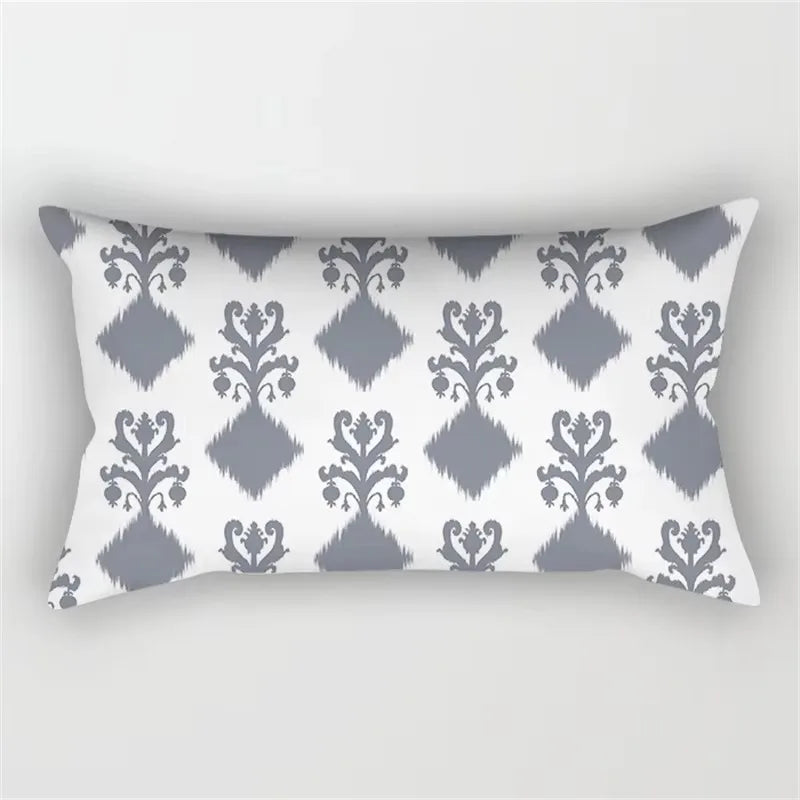 Rectangular cushion cover with decorative grey geometric patchwork pattern