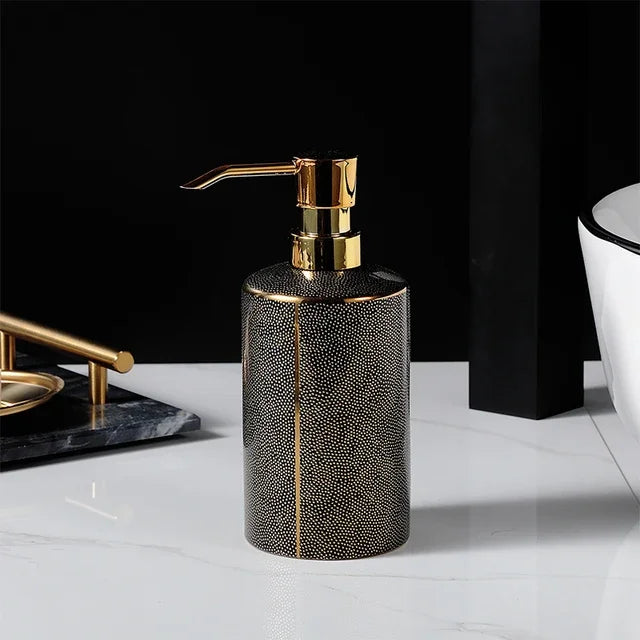 Ceramic soap dispenser and gold bathroom accessories set
