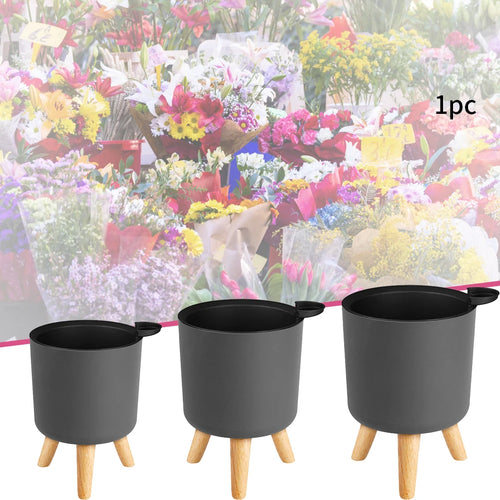 round flower pot on wooden stand for plants - vue 2 sur 8