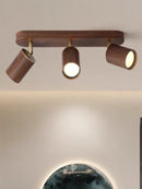 Surface mounted LED spotlight with replaceable bulb and adjustable heads