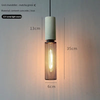 Industrial concrete pendant light with iron shade