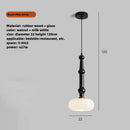Rubber wood and glass pendant light for modern interiors