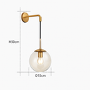 Wall light with hanging glass globe