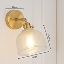 Gold LED wall light with glass lampshade