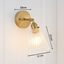 Gold LED wall light with glass lampshade
