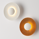 Modern metallic sun-shaped LED wall light Hasna