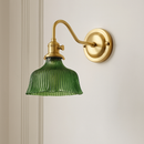 Nordic brass wall light with elegant glass shade