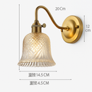 Nordic brass wall light with elegant glass shade